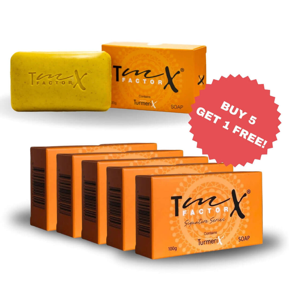 TmX Factor turmeric soap bar lathered on skin