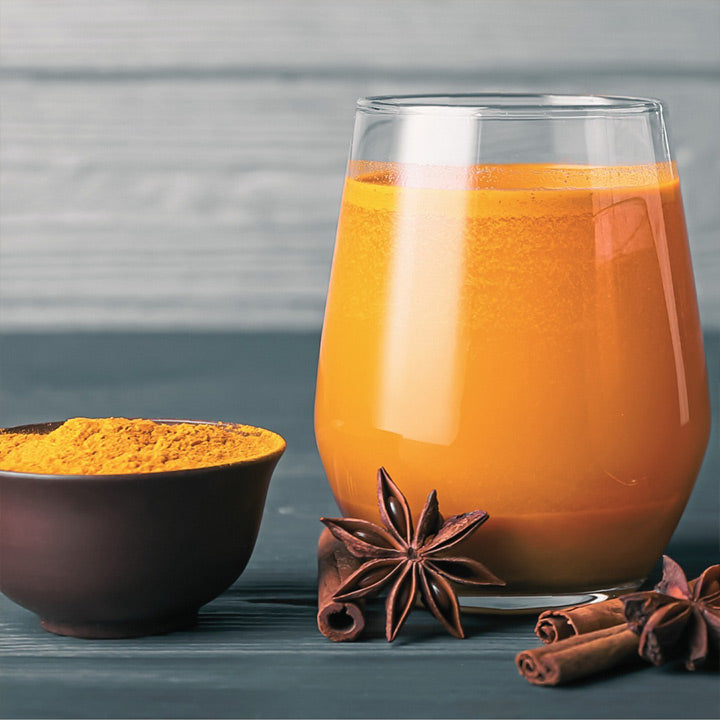 TurmeriX turmeric powder mixed into warm water drink